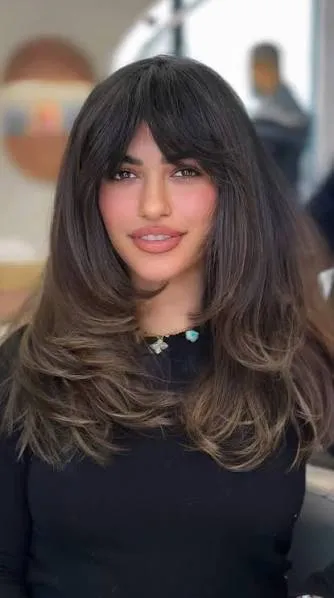 Long Layered Hair with Wispy Bangs